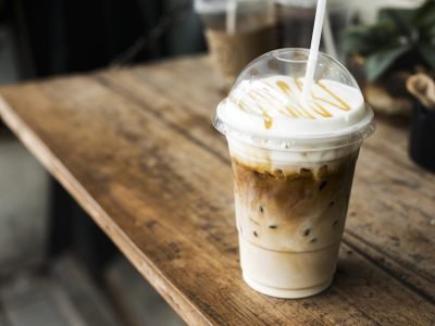 Cold beverage in a plastic cup mockup